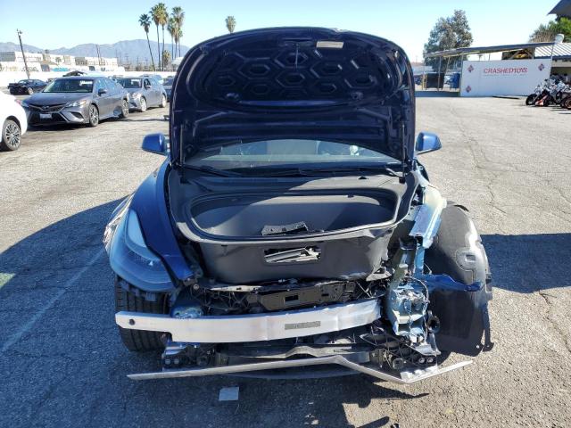 Photo 5 from auction – 2022 TESLA MODEL 3 with VIN 5YJ3E1EA6NF145476