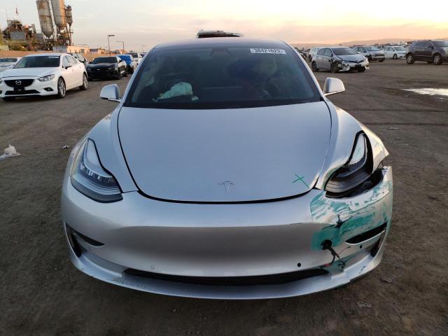 Photo 5 from auction – 2018 TESLA MODEL 3 with VIN 5YJ3E1EA9JF034849