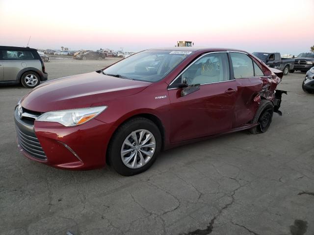 TOYOTA CAMRY HYBR 2015 with VIN 4T1BD1FK2FU149390 - Photo from auction
