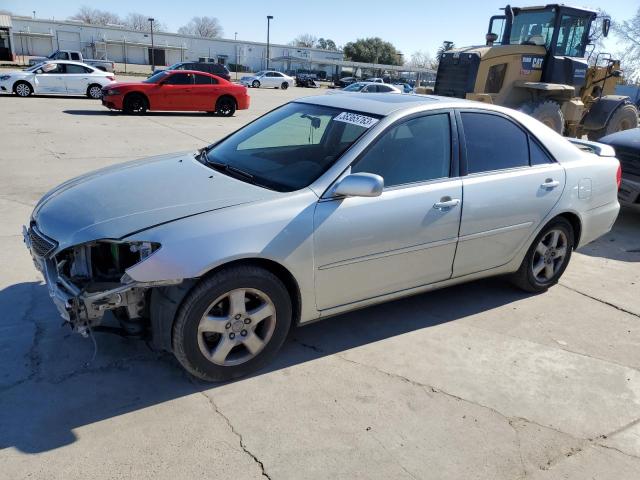 TOYOTA CAMRY LE 2002 with VIN JTDBF30K520048087 - Photo from auction
