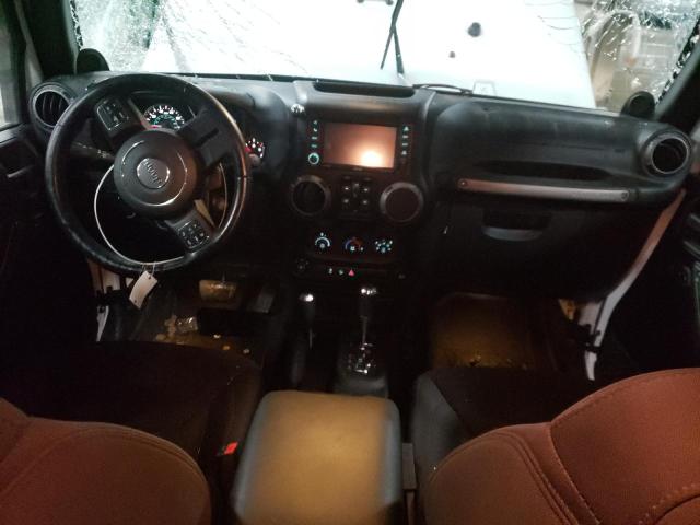 Photo 8 from auction – 2014 JEEP WRANGLER U with VIN 1C4BJWDG0EL140734