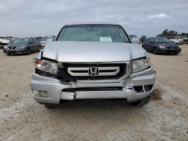 Photo 5 from auction – 2010 HONDA RIDGELINE with VIN 5FPYK1F51AB006289