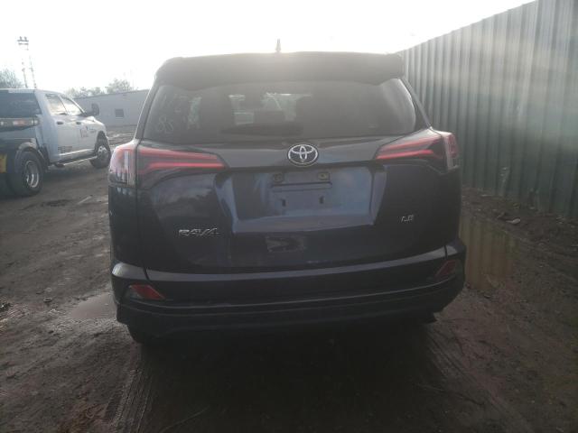Photo 6 from auction – 2018 TOYOTA RAV4 LE with VIN JTMZFREV2JJ195836