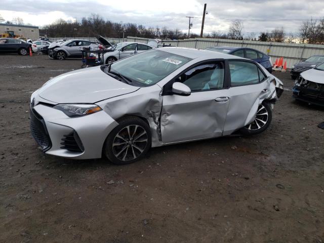 TOYOTA COROLLA L 2018 with VIN 2T1BURHEXJC077290 - Photo from auction