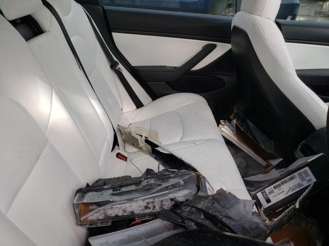 Photo 10 from auction – 2021 TESLA MODEL 3 with VIN 5YJ3E1EC3MF849733