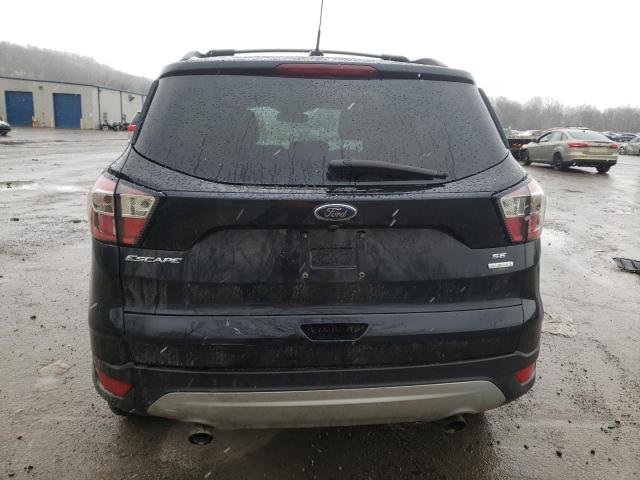 Photo 6 from auction – 2018 FORD ESCAPE SE with VIN 1FMCU9GD1JUA02652