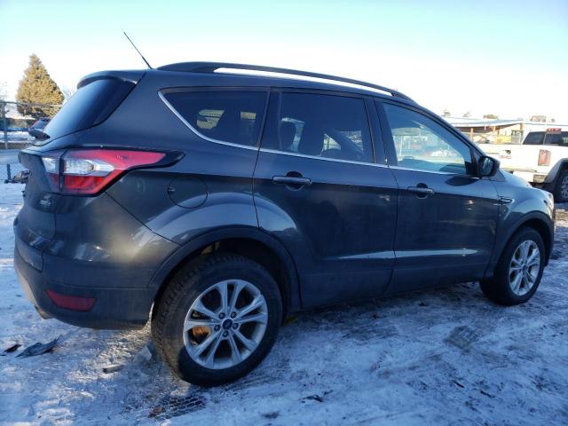 Photo 3 from auction – 2018 FORD ESCAPE SE with VIN 1FMCU9GD6JUC35071