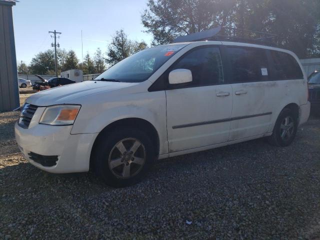 DODGE GRAND CARA 2010 with VIN 2D4RN5D19AR215993 - Photo from auction