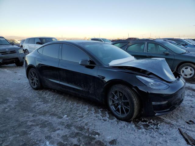 Photo 4 from auction – 2021 TESLA MODEL 3 with VIN 5YJ3E1EB6MF928420