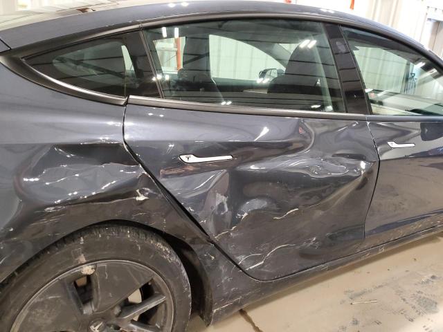 Photo 10 from auction – 2022 TESLA MODEL 3 with VIN 5YJ3E1EBXNF200889