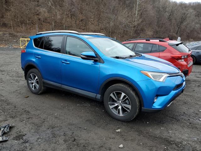 Photo 4 from auction – 2016 TOYOTA RAV4 XLE with VIN 2T3RFREV8GW445199