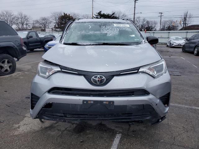 Photo 5 from auction – 2018 TOYOTA RAV4 LE with VIN JTMZFREV9JD116435