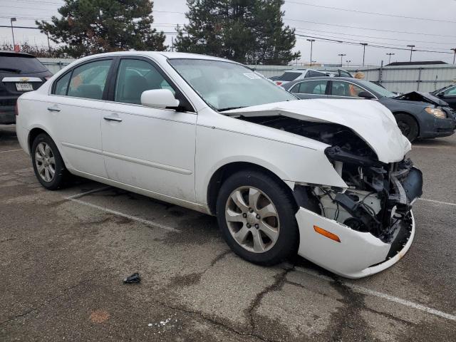 Photo 4 from auction – 2006 KIA OPTIMA LX with VIN KNAGE124965075519