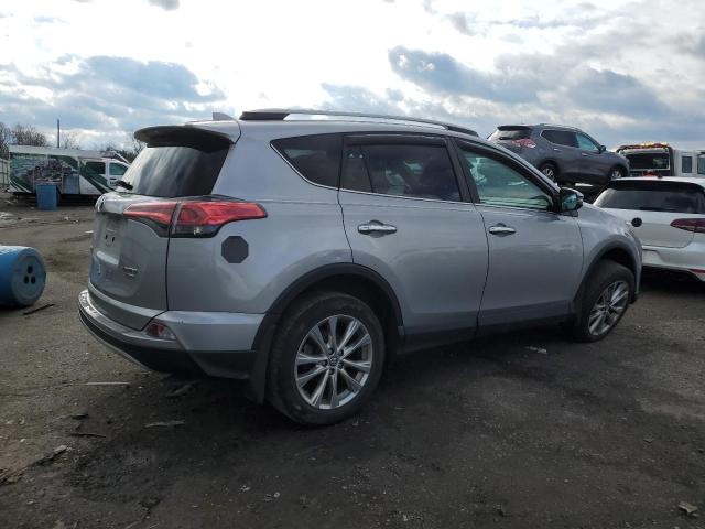 Photo 3 from auction – 2018 TOYOTA RAV4 LIMIT with VIN 2T3DFREV0JW766591