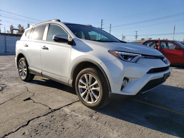Photo 4 from auction – 2018 TOYOTA RAV4 LIMIT with VIN 2T3YFREV1JW457911