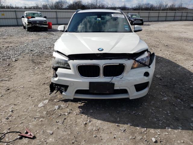 Photo 5 from auction – 2015 BMW X1 SDRIVE2 with VIN WBAVM1C51FVW56899