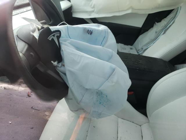 Photo 9 from auction – 2021 TESLA MODEL 3 with VIN 5YJ3E1EC3MF849733
