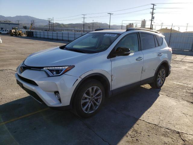 TOYOTA RAV4 LIMIT 2018 with VIN 2T3YFREV1JW457911 - Photo from auction