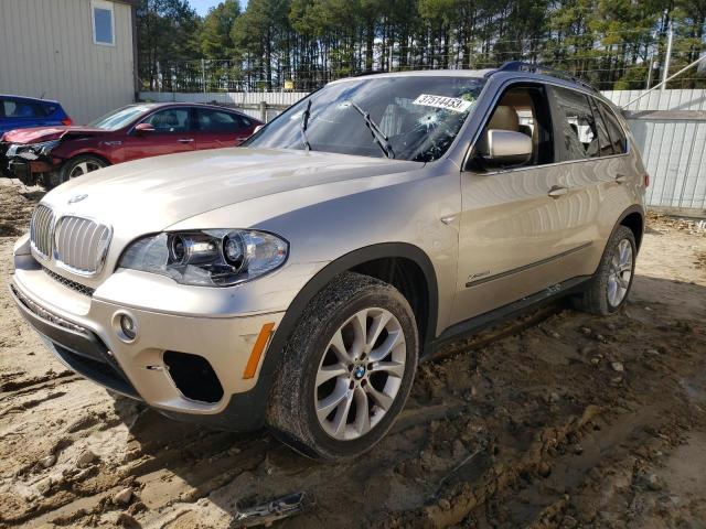 BMW X5 M 2013 with VIN 5UXZV4C53D0E05302 - Photo from auction