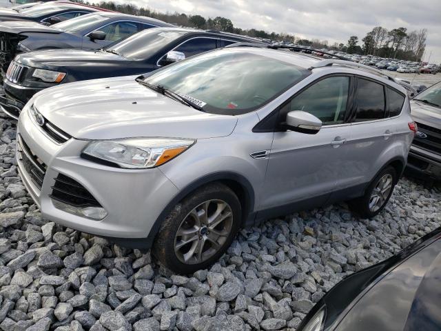 FORD ESCAPE TIT 2016 with VIN 1FMCU9JX7GUC17545 - Photo from auction