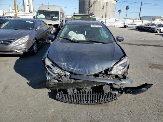 Photo 5 from auction – 2014 TOYOTA COROLLA L with VIN 5YFBURHE6EP100571