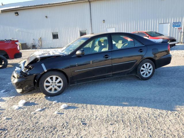 TOYOTA CAMRY LE 2004 with VIN 4T1BE30K34U290712 - Photo from auction