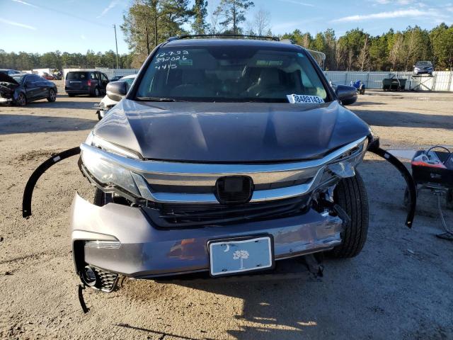 Photo 5 from auction – 2021 HONDA PILOT EXL with VIN 5FNYF5H57MB024415
