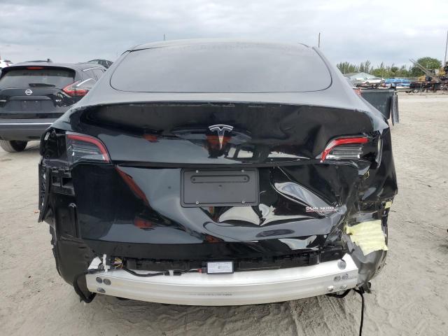 Photo 6 from auction – 2022 TESLA MODEL Y with VIN 7SAYGDEF8NF446590