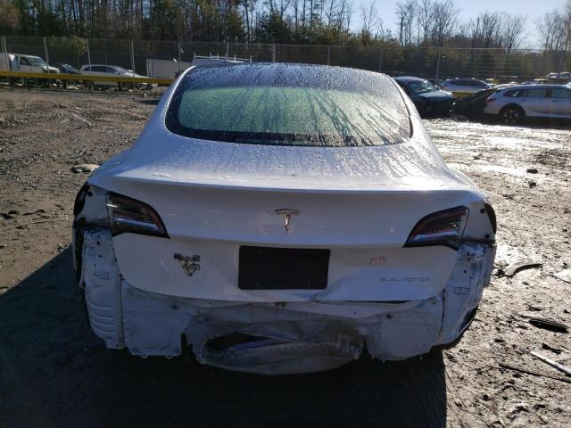 Photo 6 from auction – 2021 TESLA MODEL 3 with VIN 5YJ3E1EB0MF860292