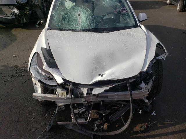 Photo 11 from auction – 2021 TESLA MODEL 3 with VIN 5YJ3E1EC3MF849733