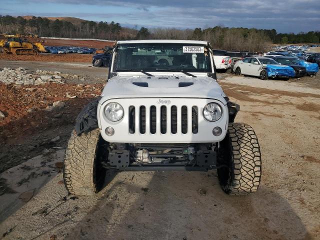 Photo 5 from auction – 2015 JEEP WRANGLER U with VIN 1C4BJWFG3FL777129