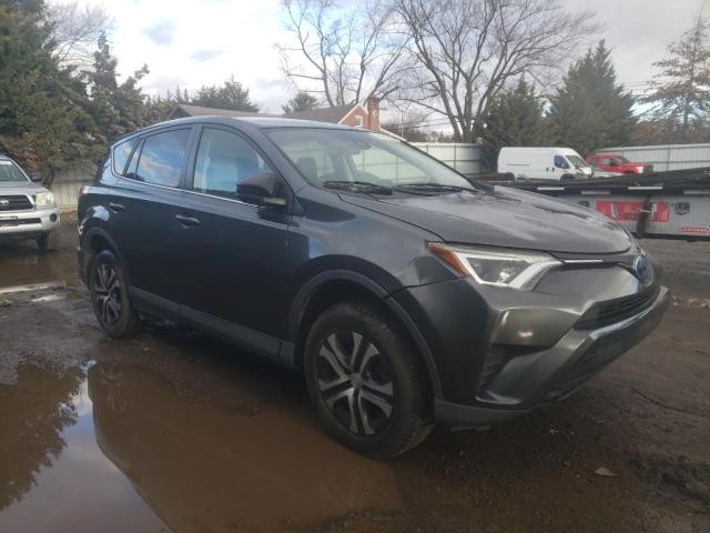 Photo 4 from auction – 2018 TOYOTA RAV4 LE with VIN JTMZFREV2JJ195836