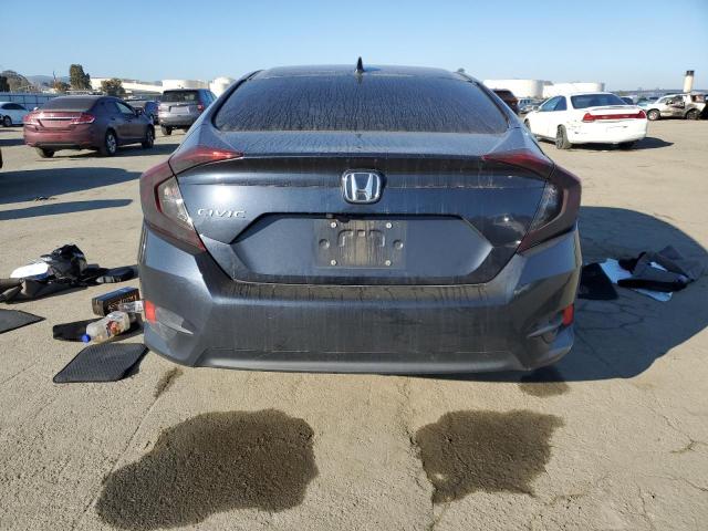Photo 6 from auction – 2018 HONDA CIVIC EX with VIN 2HGFC2F88JH559630