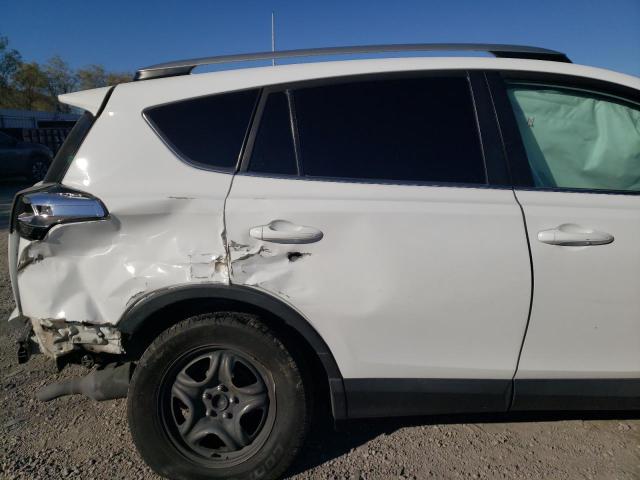 Photo 10 from auction – 2017 TOYOTA RAV4 LE with VIN 2T3ZFREV2HW358318