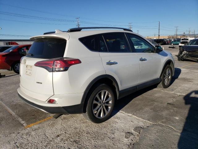 Photo 3 from auction – 2018 TOYOTA RAV4 LIMIT with VIN 2T3YFREV1JW457911