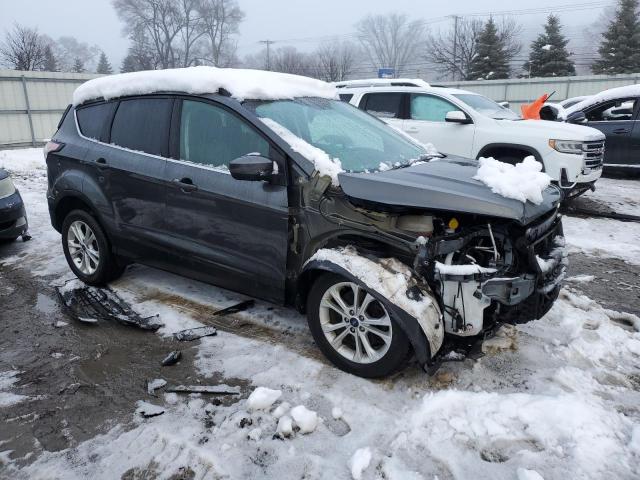 Photo 4 from auction – 2017 FORD ESCAPE SE with VIN 1FMCU9GDXHUE62077
