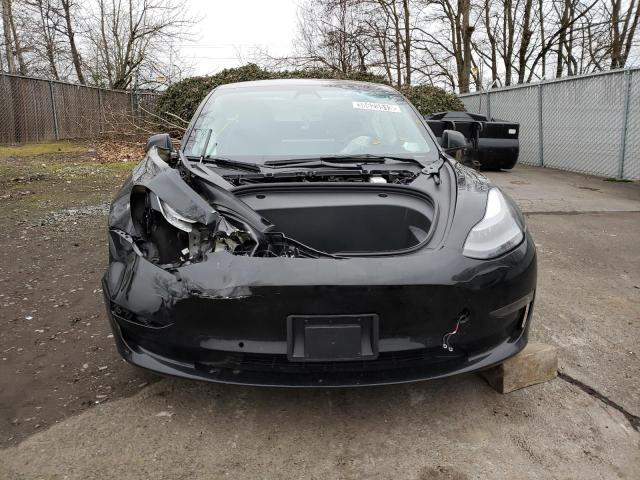 Photo 5 from auction – 2022 TESLA MODEL 3 with VIN 5YJ3E1EA5NF304097