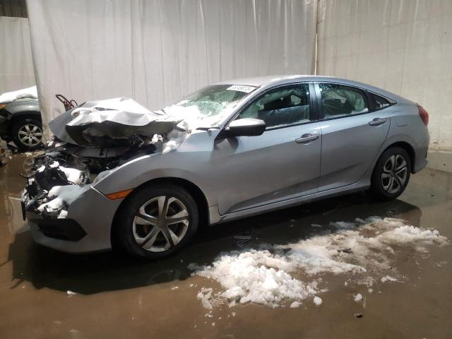HONDA CIVIC LX 2018 with VIN 2HGFC2F5XJH586026 - Photo from auction
