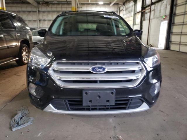 Photo 5 from auction – 2018 FORD ESCAPE SE with VIN 1FMCU9GD6JUB65622