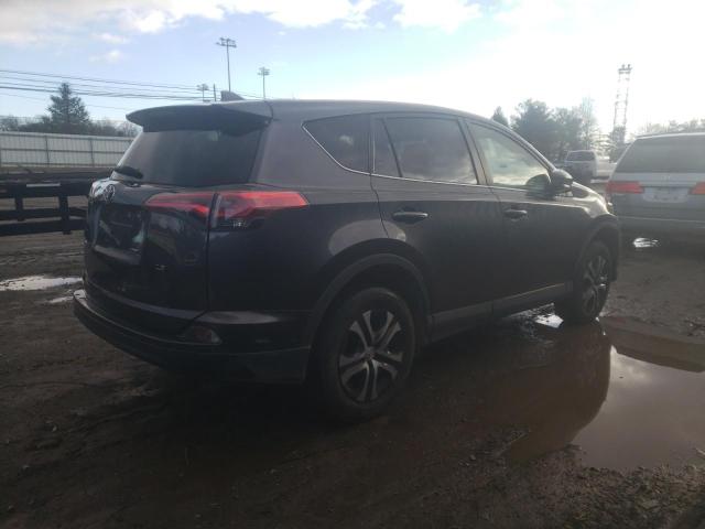 Photo 3 from auction – 2018 TOYOTA RAV4 LE with VIN JTMZFREV2JJ195836