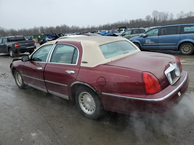 Photo 2 from auction – 1999 LINCOLN TOWN CAR E with VIN 1LNHM81W3XY658282