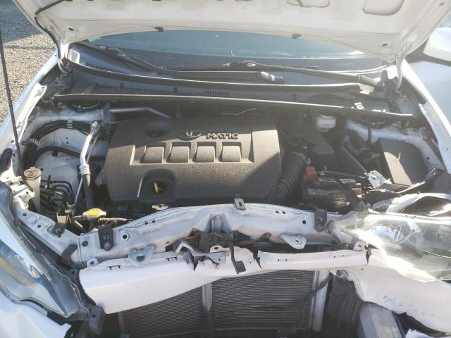 Photo 11 from auction – 2014 TOYOTA COROLLA EC with VIN 5YFBPRHE9EP103357