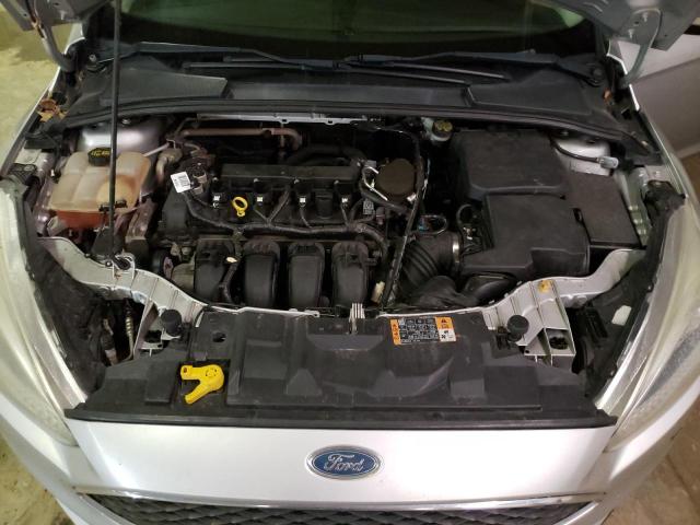 Photo 11 from auction – 2015 FORD FOCUS SE with VIN 1FADP3F24FL210539