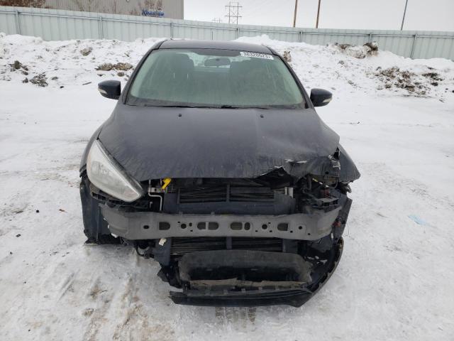 Photo 5 from auction – 2015 FORD FOCUS SE with VIN 1FADP3F24FL287704