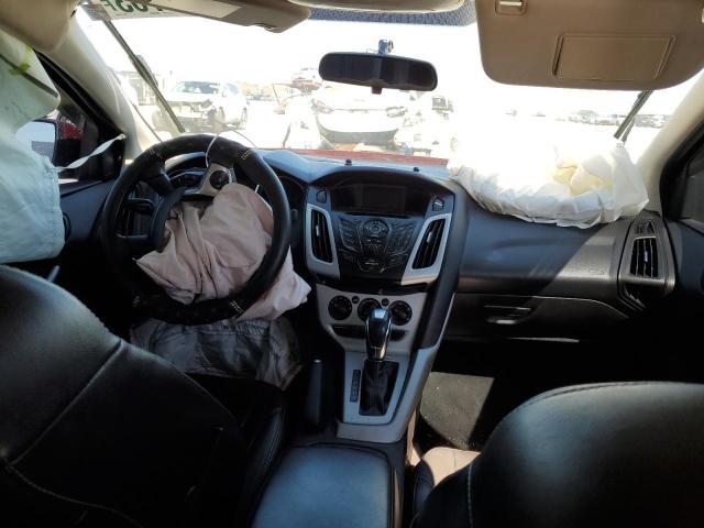 Photo 8 from auction – 2014 FORD FOCUS SE with VIN 1FADP3F27EL333380