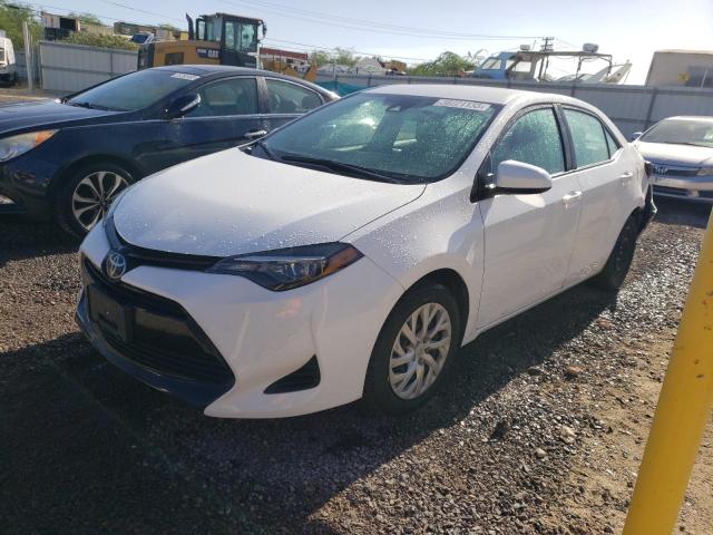 TOYOTA COROLLA L 2019 with VIN 5YFBURHE2KP902563 - Photo from auction