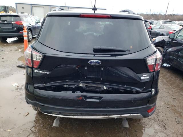 Photo 6 from auction – 2018 FORD ESCAPE SE with VIN 1FMCU0GD4JUB41847