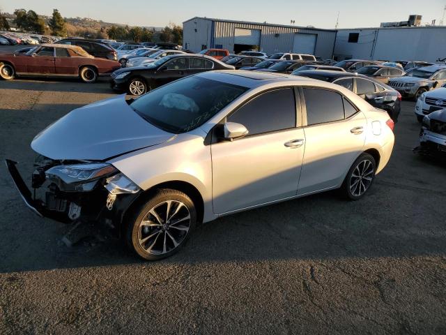 TOYOTA COROLLA L 2019 with VIN 5YFBURHE2KP867975 - Photo from auction