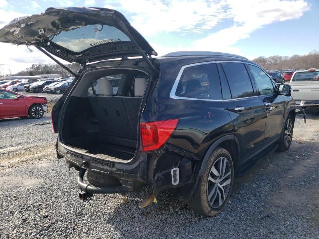 Photo 3 from auction – 2018 HONDA PILOT TOUR with VIN 5FNYF5H92JB001364