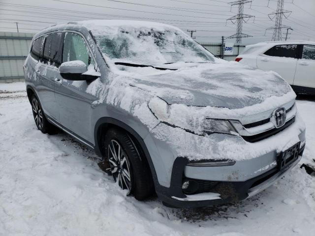 Photo 4 from auction – 2022 HONDA PILOT TOUR with VIN 5FNYF6H65NB089019
